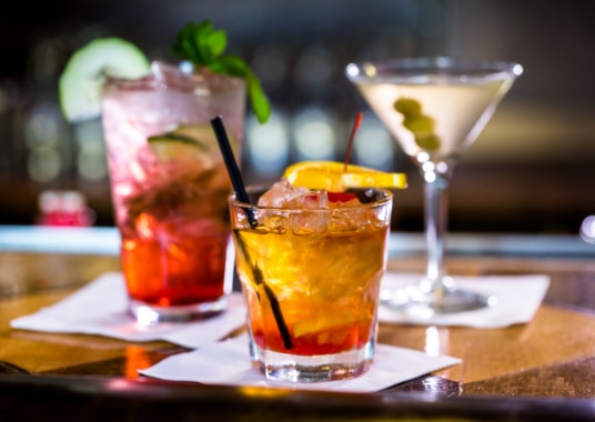 Village Residences Clarke Quay - Three cocktails at a bar